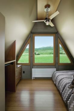 Throughout the house, new, larger windows open to views of the Teton Range.