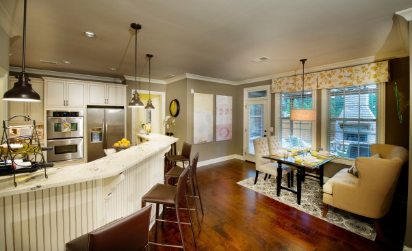 Kitchens in the Essex model at the sold-out Woodbridge Crossing community in Selma, Ga., are roomy enough for a dining table and a breakfast bar. The homes were priced in the $300s.