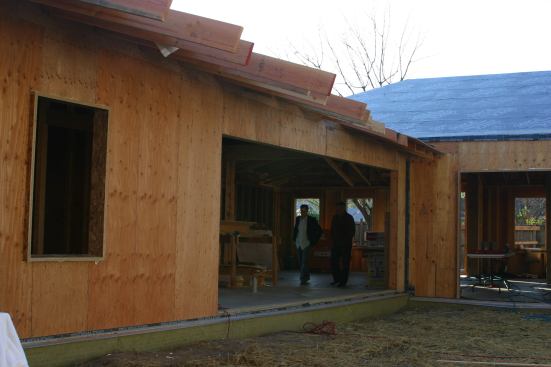 Open Architecture. One of the wings of the house will include a 16- by 8-foot slide and lift door entrance.