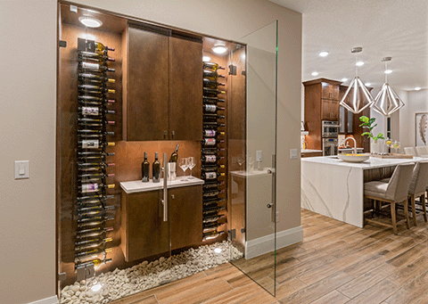 Spaces specifically used to entertain friends and family are more important than ever, like this wine center from the Taylor Morrison NEXTadventure home.
