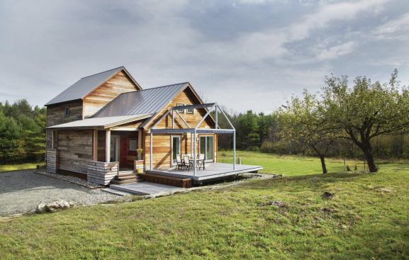 This Passive House–certified home draws on the rural New England vernacular. Its low-maintenance exterior and modernist details reflect contemporary tastes and priorities.