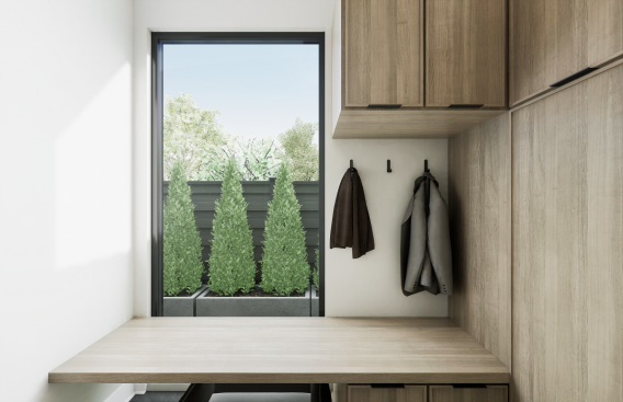 Walking inside from the garage, users can add a mudroom with bench seating, hooks, and storage or an office nook with a built-in desk and cabinetry.